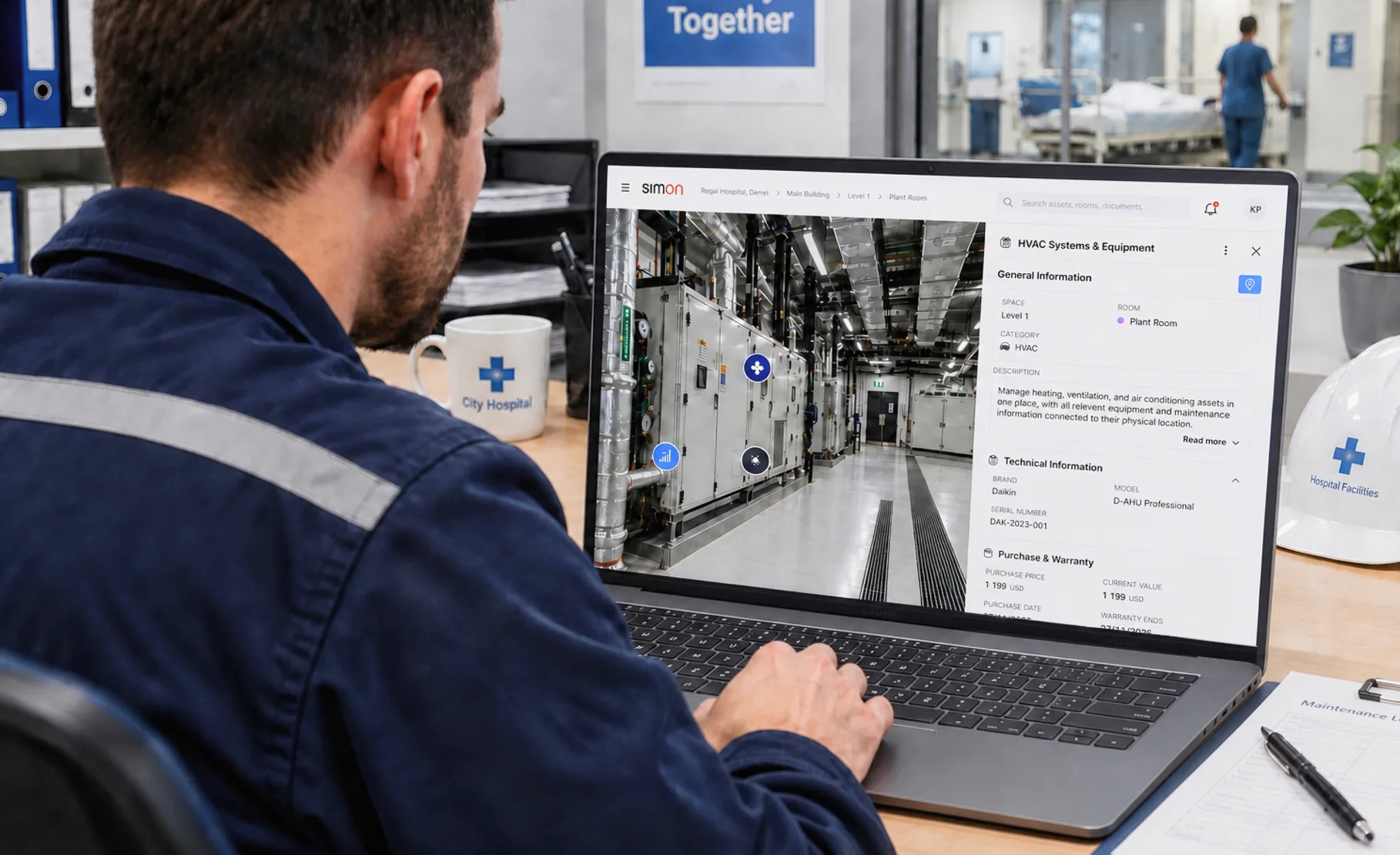 Facilities worker at a laptop viewing a plant room 3D scan with asset pins and an HVAC equipment record panel in a hospital office